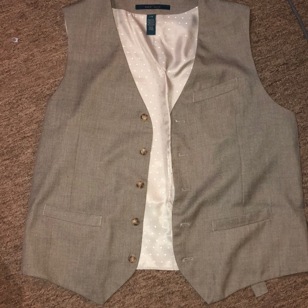 A large size tan male vest that had never worn.